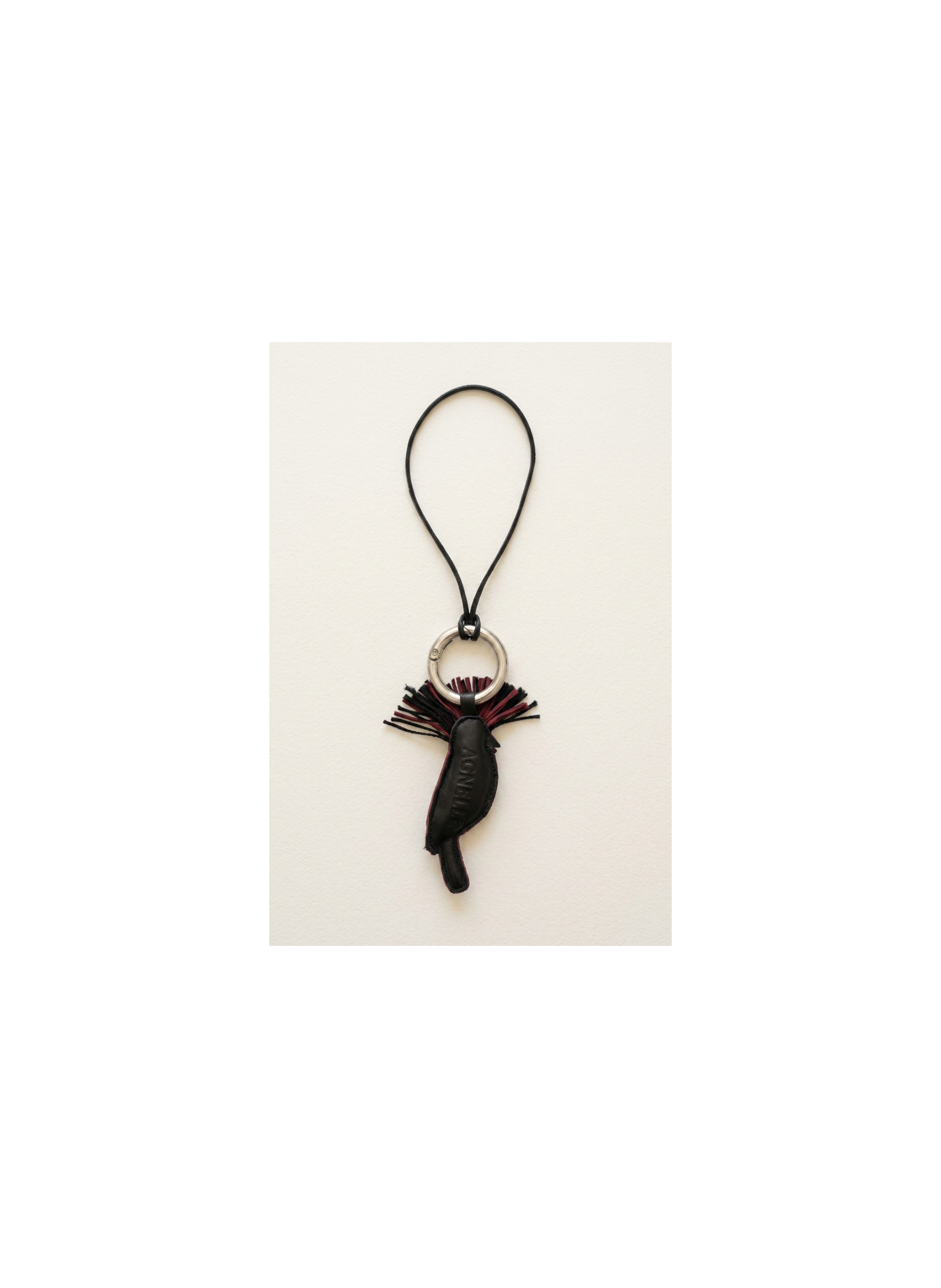 Porte clé oiseau coq-de-roche en cuir agneau et lien en cuir